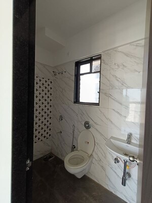 Bathroom in 1 BHK Apartment at UK Iridium Tower 2, Kandivali East – for Rent