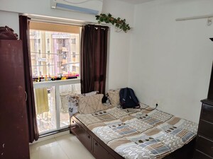 Living Room in 1 BHK Apartment at Godrej Tranquil, Kandivali East – for Rent