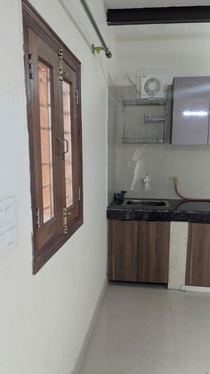 Kitchen in 3 BHK Apartment at RWA Apartments Sector 122, Sector 122 – for Rent
