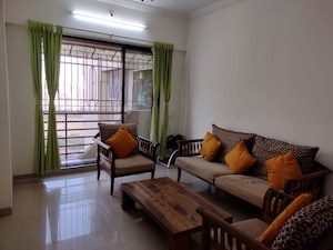 Living Room in 1 BHK Apartment at Raunak Heights, Ghodbunder Road – for Rent