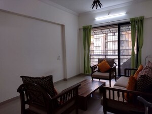 Living Room in 1 BHK Apartment at Raunak Heights, Ghodbunder Road – for Rent