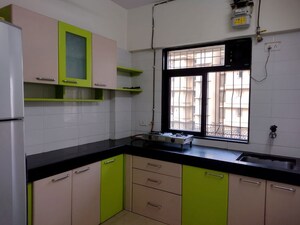 Kitchen in 1 BHK Apartment at Raunak Heights, Ghodbunder Road – for Rent