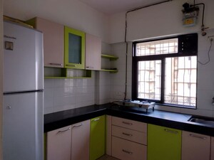 Kitchen in 1 BHK Apartment at Raunak Heights, Ghodbunder Road – for Rent