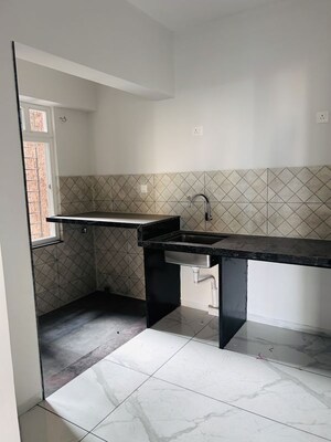 Kitchen in 3 BHK Apartment at Rahul Downtown, Punawale – for Rent