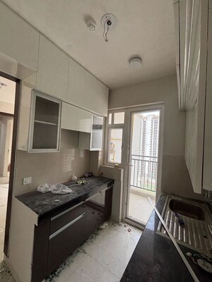 Kitchen in 2 BHK Apartment at Eldeco Live By The Greens, Sector 150 – for Rent