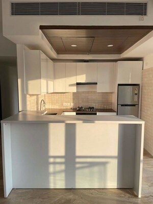 Kitchen in 2 BHK Apartment at Supertech Supernova Nova Residences, Sector 94 – for Sale