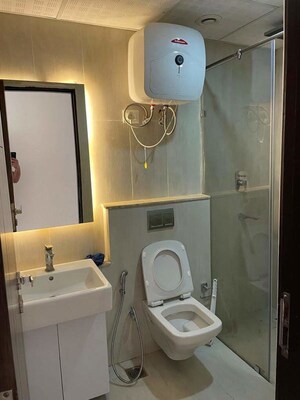 Bathroom in 2 BHK Apartment at Supertech Supernova Nova Residences, Sector 94 – for Sale