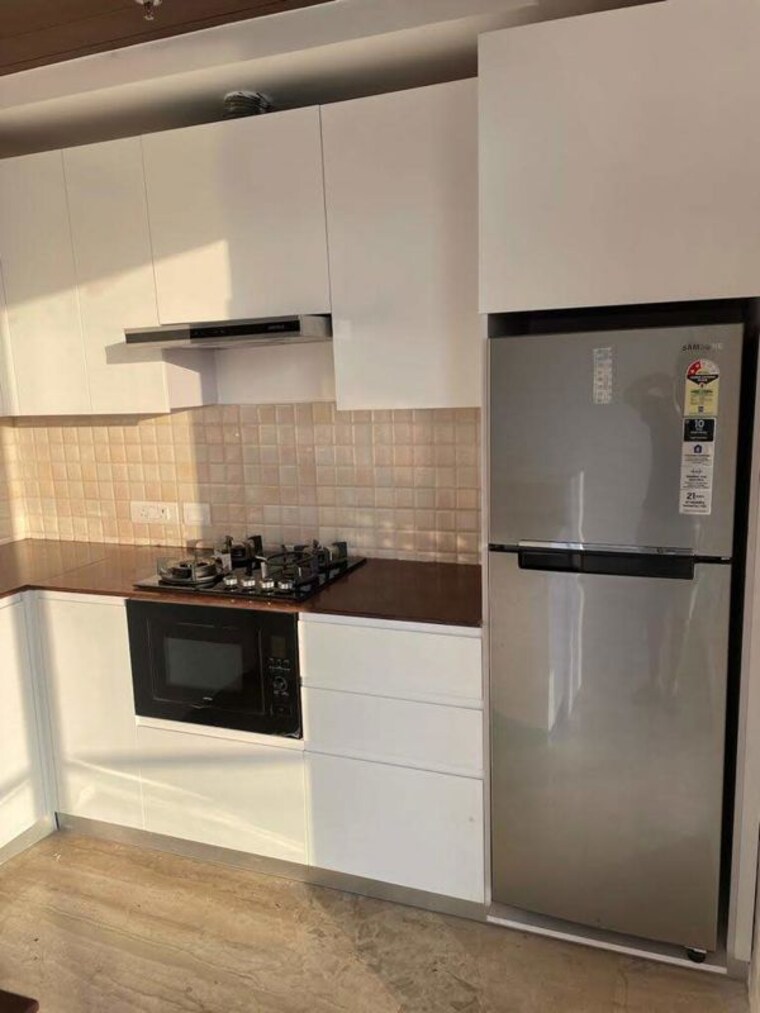 Kitchen, supertech-supernova-nova-residences 3 Bedroom 2105 Sq.Ft. Apartment In Sector 94 Noida 9656363