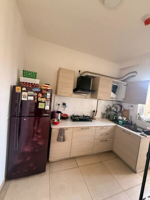 Kitchen in 2 BHK Apartment at Bhartiya City Nikoo Homes II, Thanisandra Main Road – for Rent
