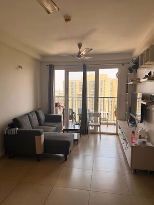 Living Room in 2 BHK Apartment at Bhartiya City Nikoo Homes II, Thanisandra Main Road – for Rent