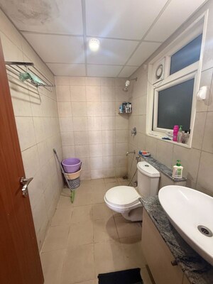 Bathroom in 3 BHK Apartment at Bhartiya City Nikoo Homes II, Thanisandra Main Road – for Rent