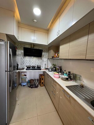 Kitchen in 2 BHK Apartment at Bhartiya City Nikoo Homes II, Thanisandra Main Road – for Rent