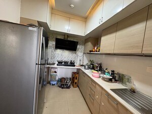 Kitchen in 2 BHK Apartment at Bhartiya City Nikoo Homes 4, Thanisandra Main Road – for Rent