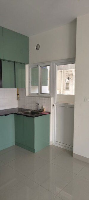 Kitchen in 2 BHK Apartment at Adarsh Greens, Kogilu – for Rent