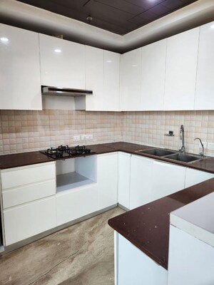 Kitchen in 3 BHK Apartment at Supertech Supernova Nova Residences, Sector 94 – for Rent