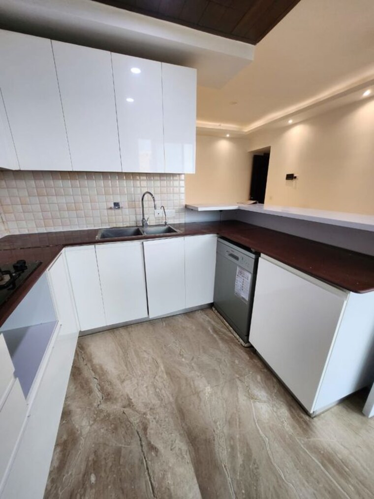 Kitchen, supertech-supernova-nova-residences 3 Bedroom 2105 Sq.Ft. Apartment In Sector 94 Noida 9656603