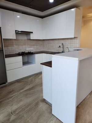 Kitchen in 3 BHK Apartment at Supertech Supernova Nova Residences, Sector 94 – for Rent