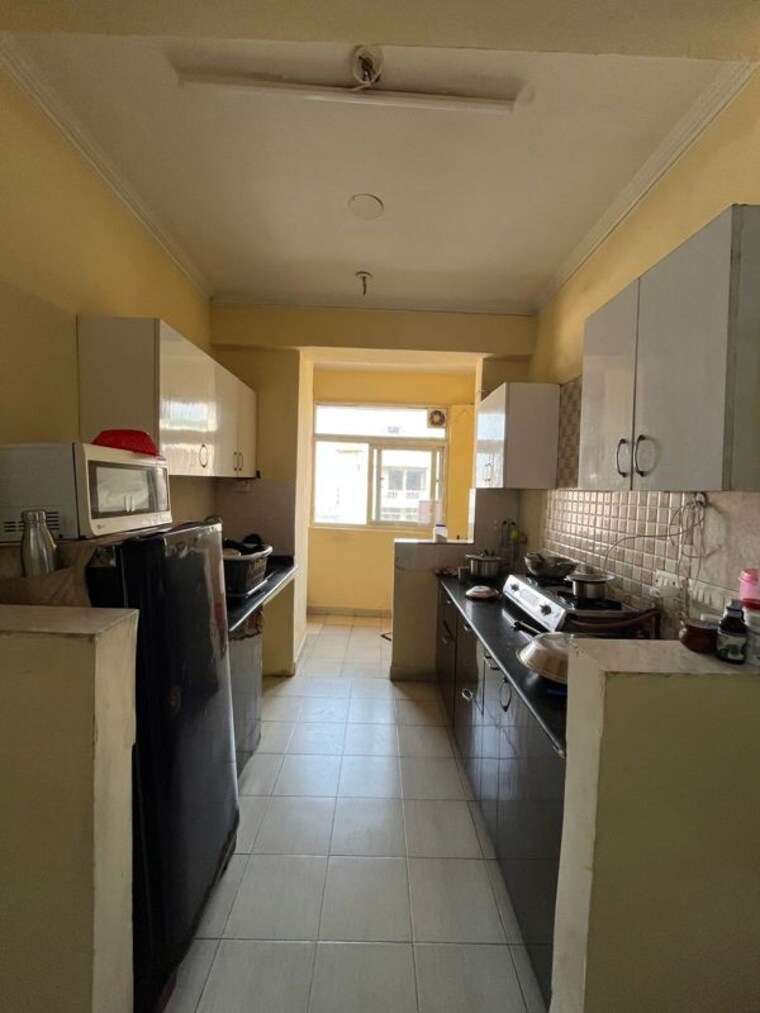 Kitchen, amrapali-silicon-city 2.5 Bedroom 1180 Sq.Ft. Apartment In Sector 76 Noida 10406161