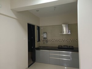 Kitchen in 2 BHK Apartment at Sahyadri Shruberry, Moshi – for Rent