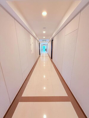 Building Lobby in 2 BHK Apartment at Kanakia Spaces Niharika, Manpada – for Rent