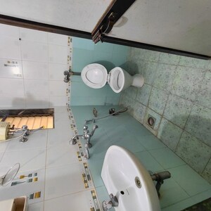 Bathroom in 2 BHK Apartment at Sadguru Complex I, Goregaon East – for Sale