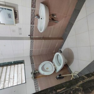 Bathroom in 2 BHK Apartment at Sadguru Complex I, Goregaon East – for Sale