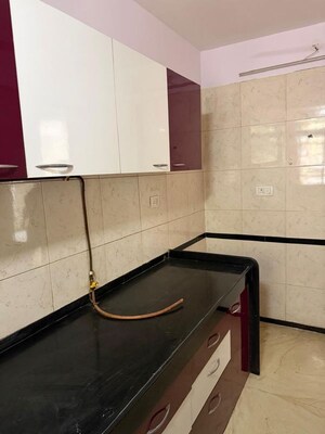 Kitchen in 2 BHK Apartment at Deonar Apartments, Chembur – for Rent