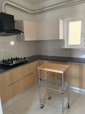 Kitchen in 3 BHK Apartment at Godrej Aqua, International Airport Road – for Rent