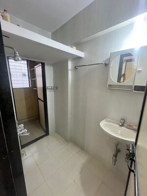 Bathroom in 1 BHK Apartment at Ghantali CHS, Naupada – for Rent