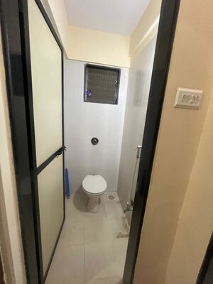 Bathroom in 1 BHK Apartment at Ghantali CHS, Naupada – for Rent