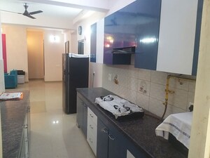 Kitchen in 2 BHK Apartment at Panchsheel Wellington, Dundahera – for Sale