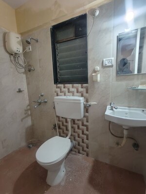 Bathroom in 1 BHK Apartment at Hubtown Greenwoods B Wing, Vartak Nagar – for Sale