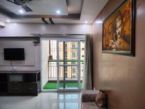 Living Room in 3 BHK Apartment at Aims Golf City, Sector 75 – for Rent