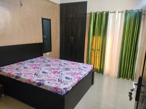 Bedroom in 3 BHK Apartment at Aims Golf City, Sector 75 – for Rent