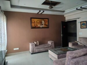 Living Room in 3 BHK Apartment at Aims Golf City, Sector 75 – for Rent