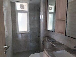 Bathroom in 3.5 BHK Apartment at DLF Gardencity Enclave, Sector 93 – for Sale