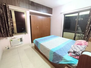 Bedroom in 2 BHK Apartment at Jasmine Tower, Vasant Vihar – for Rent