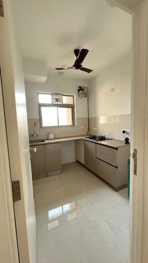Kitchen in 1 BHK Apartment at Hiranandani Estate Solitaire C, Ghodbunder Road – for Rent