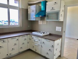 Kitchen in 4 BHK Apartment at Emaar Palm Terraces Select, Sector 66 – for Sale