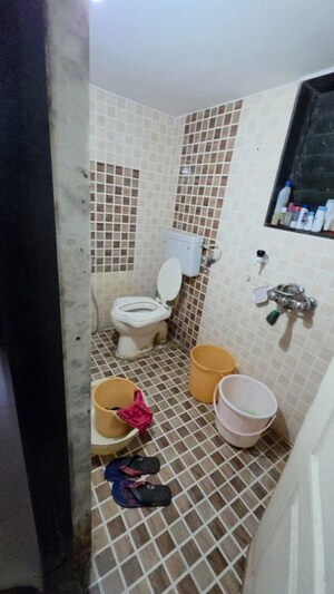 Bathroom in 2 BHK Apartment at Ramdev Park, Mira Road – for Rent