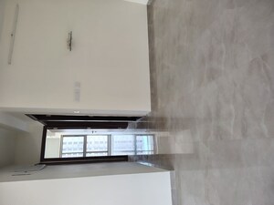 Room in 2 BHK Apartment at Sheth Auris Bliss, Malad West – for Rent