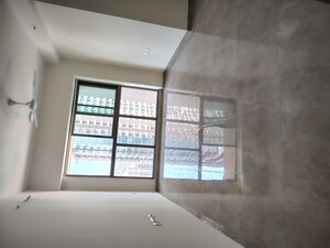 Room in 2 BHK Apartment at Sheth Auris Bliss, Malad West – for Rent