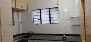 Kitchen in 2 BHK Apartment at Narayan Peth – for Sale