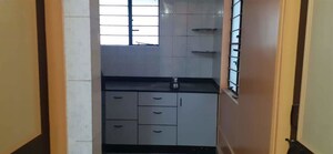 Kitchen in 2 BHK Apartment at Narayan Peth – for Sale