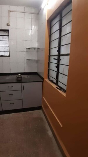Kitchen in 2 BHK Apartment at Narayan Peth – for Sale