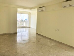Living Room in 4 BHK Apartment at Emaar Palm Terraces Select, Sector 66 – for Sale