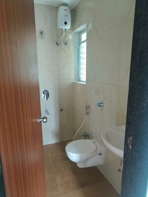 Bathroom in 1 BHK Apartment at Raunak Bliss B2, Ghodbunder Road – for Rent