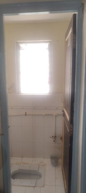 Bathroom in 1 BHK Apartment at Anshul Shree Hans Garden, Dhanori – for Rent