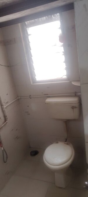 Bathroom in 1 BHK Apartment at Anshul Shree Hans Garden, Dhanori – for Rent