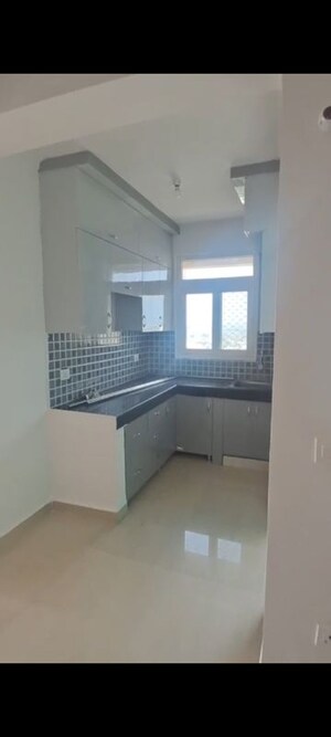 Kitchen in 2 BHK Apartment at Nilaya Greens, Raj Nagar Extension – for Sale